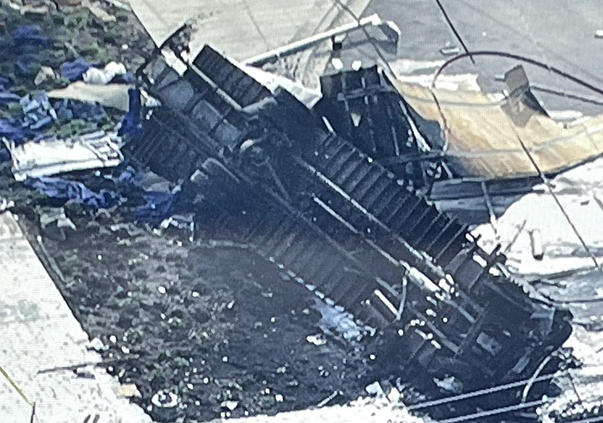 A semi lies charred and twisted after a crash at Prospect Avenue in Clarendon Hills. It was hit by an IB METRA BNSF train. No reported injuries aboard the train, however, the occupant(s) of the truck weren't so fortunate