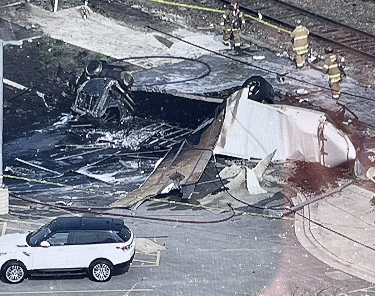 Devastation in the aftermath of a collision between an inbound METRA BNSF train & a semi at Prospect Avenue in Clarendon Hills. The crash left one train passenger dead and 4 others hurt, including the engineer &amp; conductor.