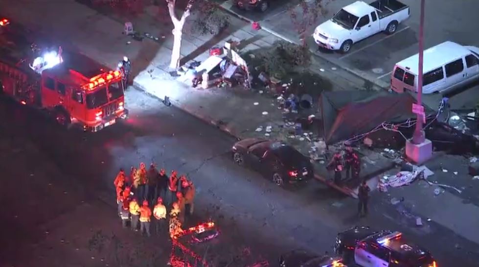One person was killed and eight others were injured after a car plowed through a taco stand near Holt Ave. and Dudley St. in Pomona tonight. Police are urging the public to avoid the area as they conduct their investigation.
