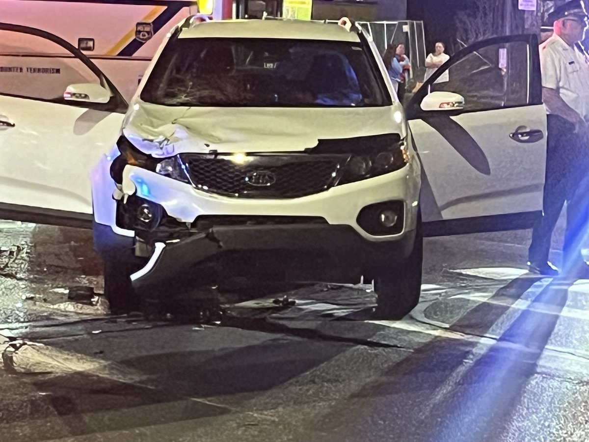 Deadly scene at Academy Road & Frankford Ave. @PhillyPolice take the handles to the smashed scooter, the bottom part is under Kia. The front end of the Kia smashed where 48 year old woman on scooter killed,hit practically head on as Kia was turning onto Academy road to get on 95