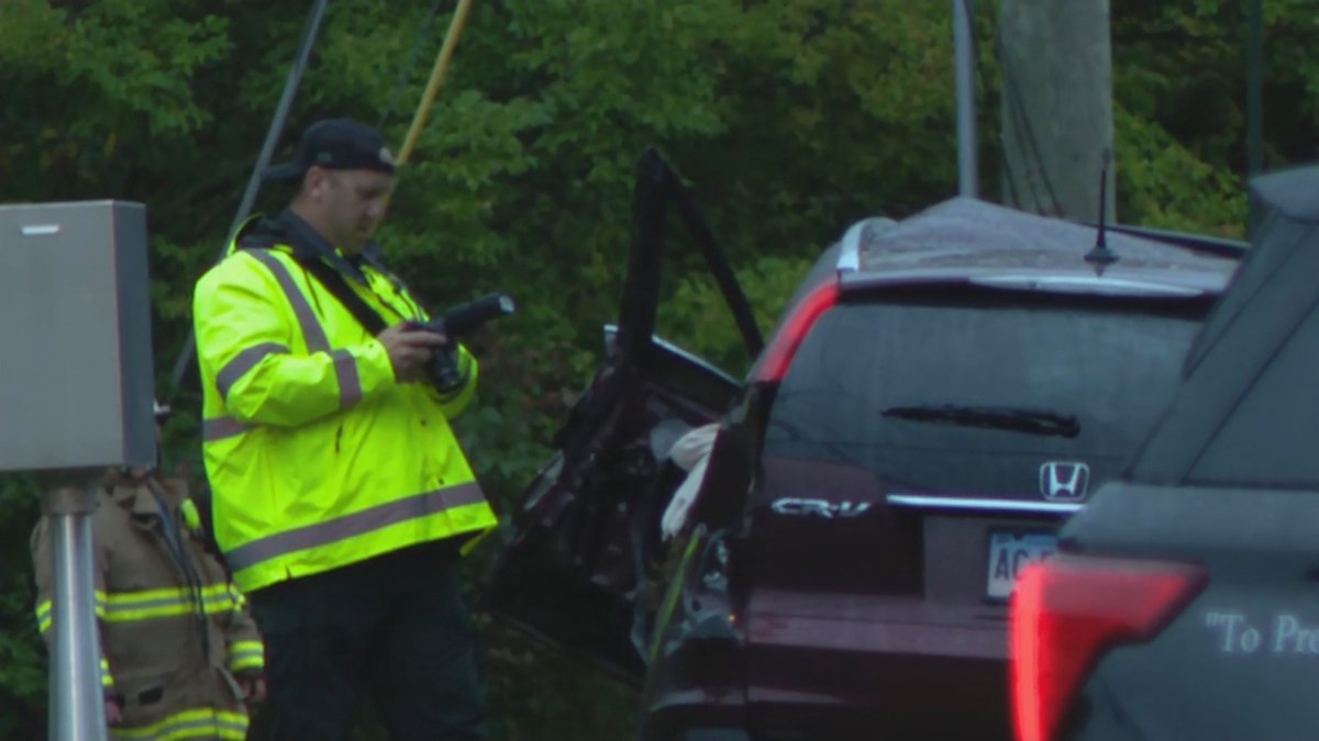 Four people are in the hospital after being extricated from a car that collided with a corn truck in Stonington