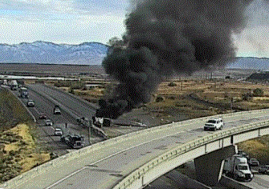 I-80 MM-102 EB. A semi with 2 trailers has crashed, rolled over, and caught fire. Trooper on scene advises reports that the driver was trapped. All EB traffic is being diverted to U-201 EB.