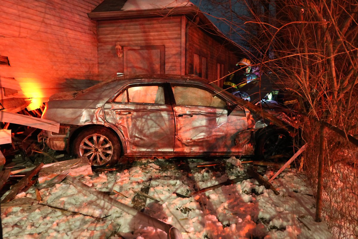 IMPD is investigating after a two-car crash overnight near North Belmont Avenue and West 10th Street sent one of the cars completely through a vacant building.