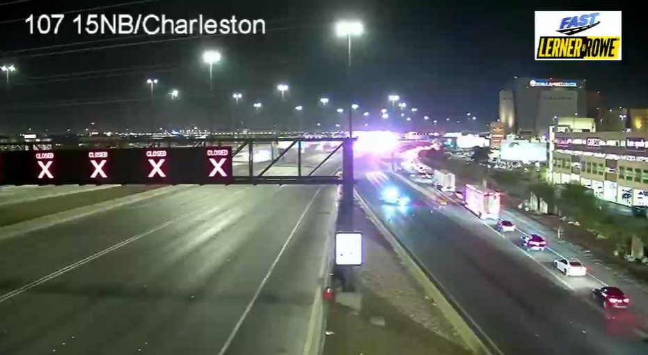 A deadly crash has closed all lanes at I-15 and Charleston Boulevard, police say.
